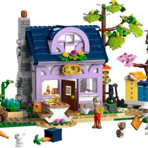 Brand new factory sealed LEGO Friends Beekeepers' House and Flower Garden set 42669 original box front view.