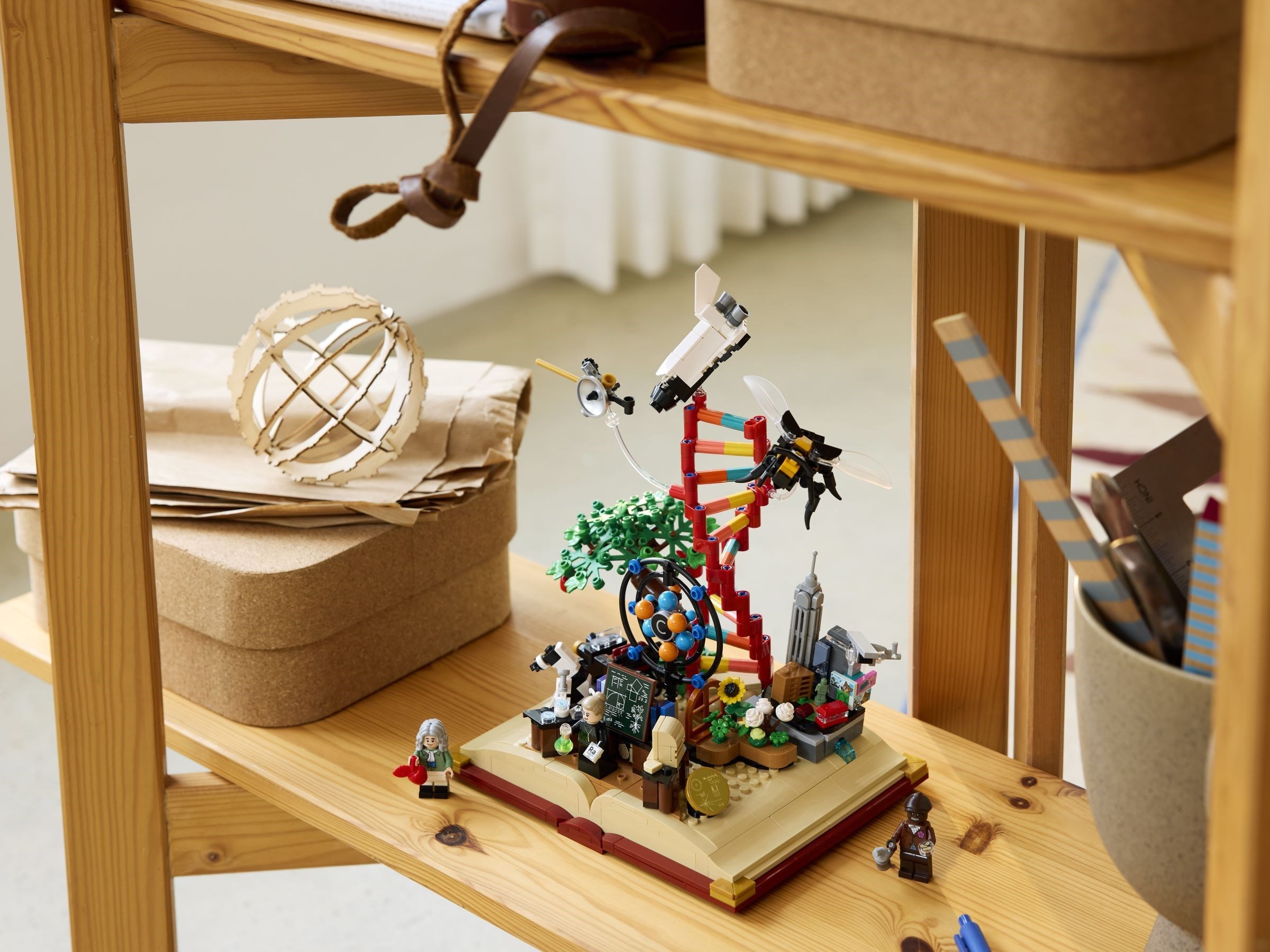Additional photo of brand new factory sealed LEGO Ideas The Evolution of STEM set 21355.