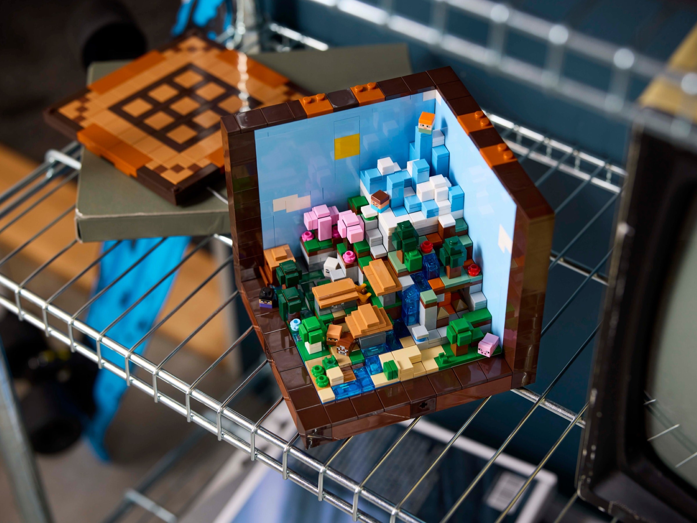 Additional photo of brand new factory sealed LEGO Minecraft The Crafting Table set 21265.