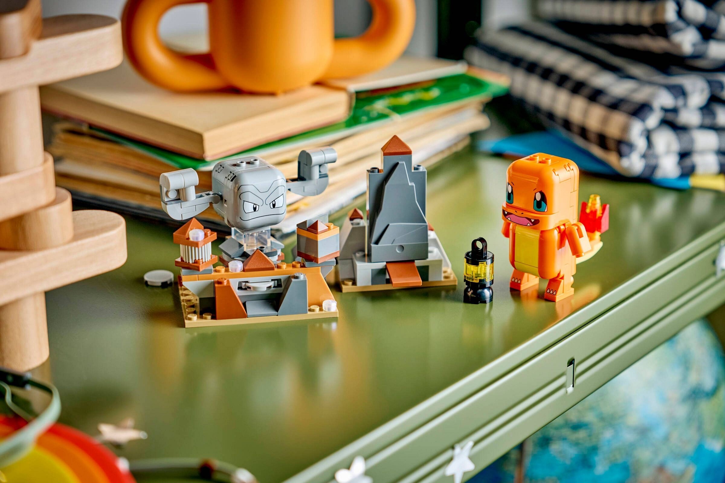 Additional photo of brand new factory sealed LEGO Pokémon Charmander and Geodude's Cavern Clash set 72157.